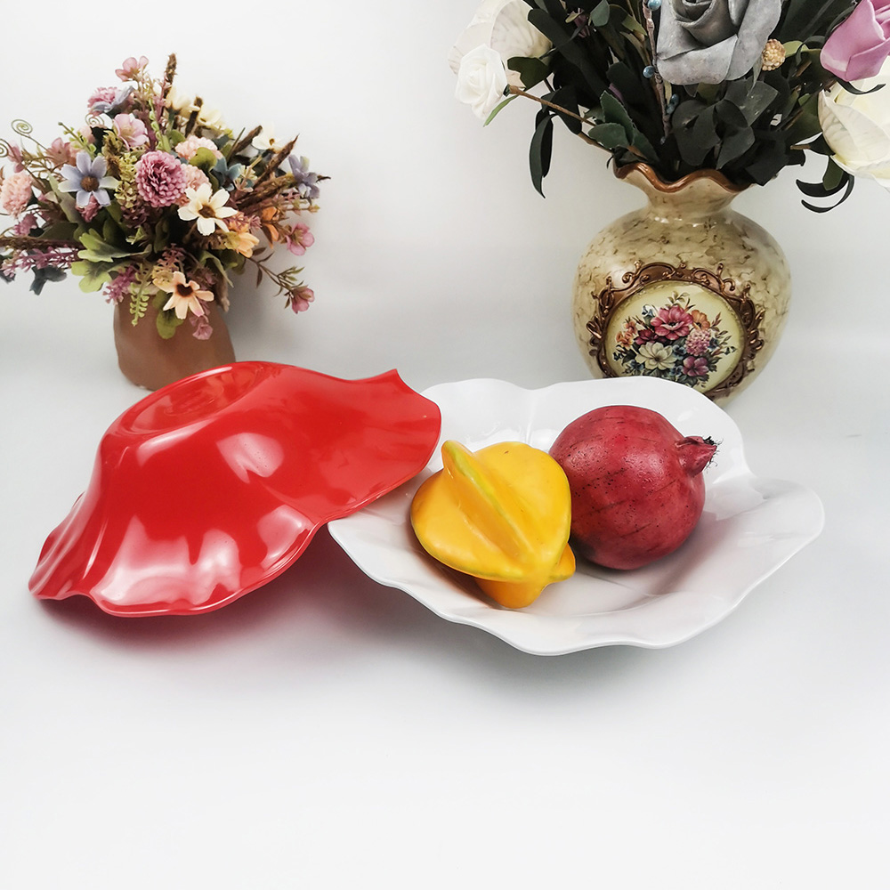 Milieuvriendelijke creatieve lotusblad westers voedsel salade fruitschaal